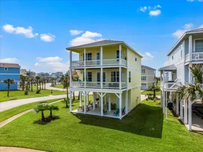 Soak up the sunshine and the sound of the breaking waves on one of three porches - a favorite place to spend time together. 