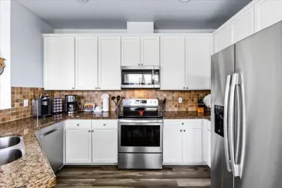 Fully equipped kitchen with modern appliances - perfect for whipping up beachside breakfasts and sunset dinners and everything you need to feel right at home.
