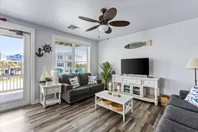 Kick back and relax in this cozy living room with comfy seating and a flat-screen TV - ideal for movie nights! 