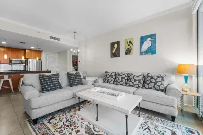 Bright and stylish living room with chic coastal décor and stunning natural light.
