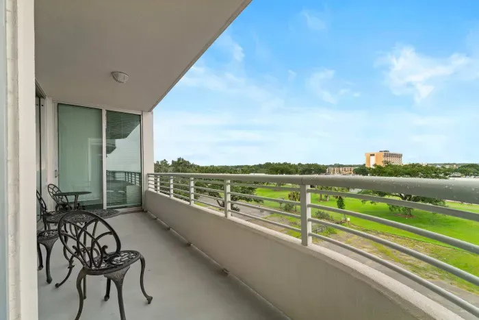 Private balcony with sweeping panoramic views of the coastline designed for sunrise coffee moments and sunset unwinding.