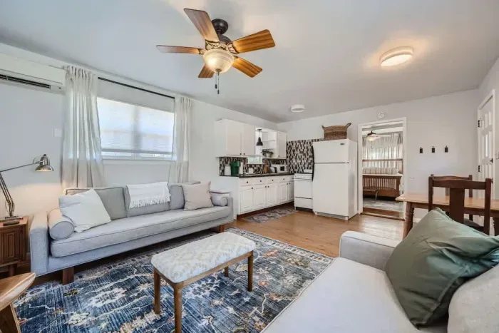 Kick back in a cozy living room with plenty of seating for everyone.