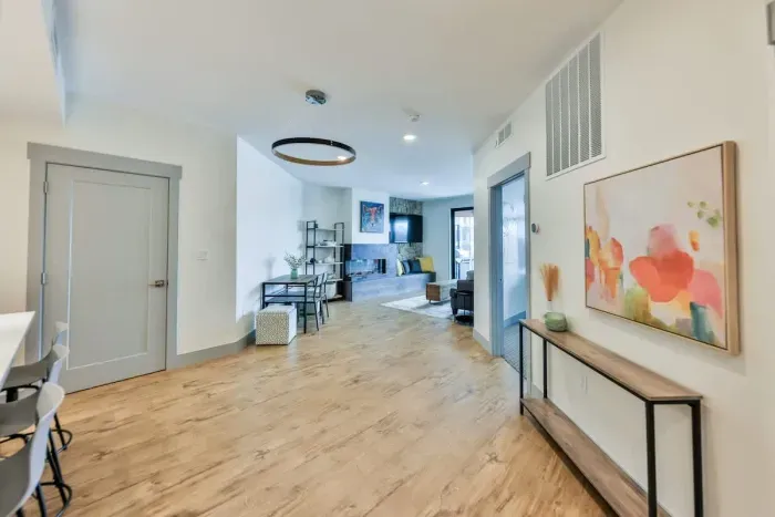 A spacious open layout guiding you into a refined living experience with modern flair.