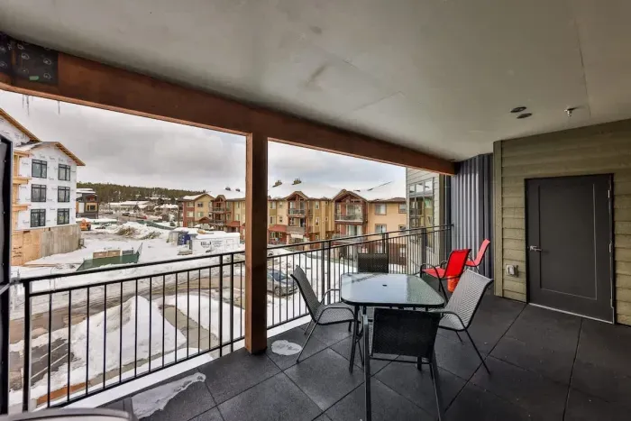 An expansive private balcony with striking views and luxurious outdoor seating.
