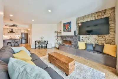 A comfortable spot to relax with upscale furnishings and sunlit alpine views.