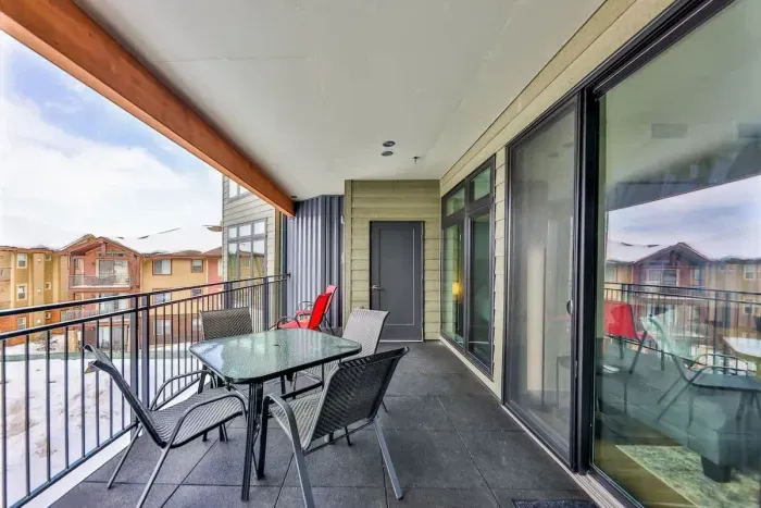 Savor the fresh mountain air from an expansive private balcony with panoramic views.