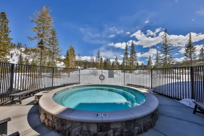 Relax in the outdoor hot tub, perfectly positioned to take in Winter Park’s iconic peaks.