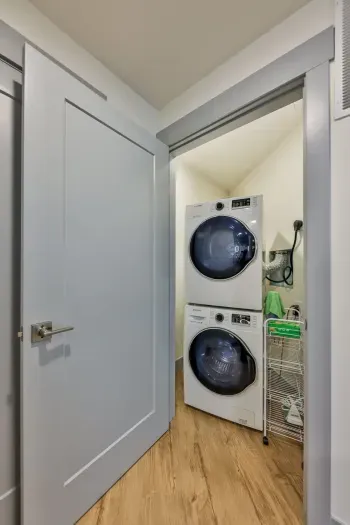 Spacious laundry room with modern appliances for effortless convenience during your stay.