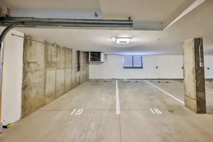 A generously sized assigned parking area providing secure, effortless arrival.