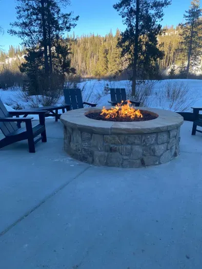 Unwind by the fire pit and soak in remarkable mountain views in total comfort.