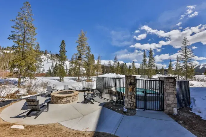 A charming snow-lined walkway offering a peaceful journey through nature.