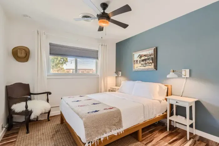 Serene bedroom with calming colors and thoughtfully chosen furnishings.