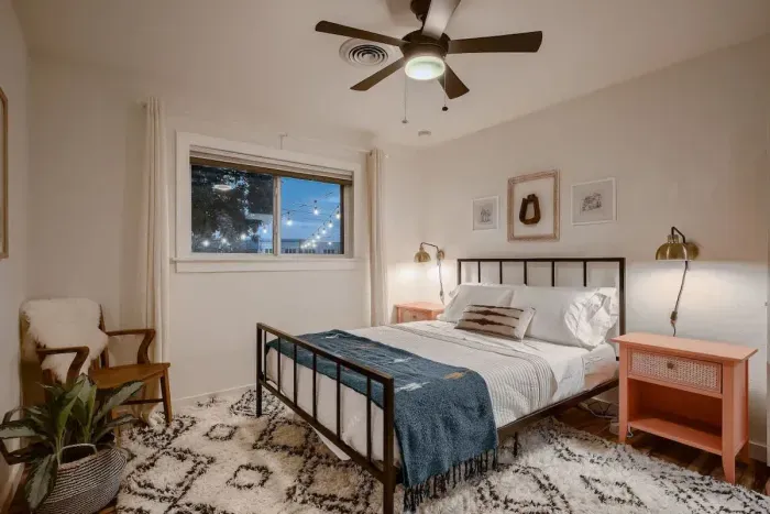 Cozy secondary bedroom featuring a comfortable floor mat, creating a relaxed and inviting atmosphere. Perfect for guests or family members, this room offers a laid-back space with plenty of room to unwind.