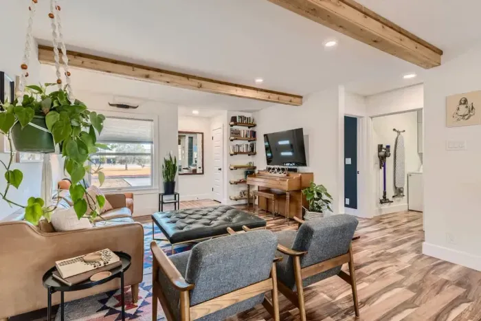 Spacious living area with comfortable couches, perfect for gathering with friends and family.