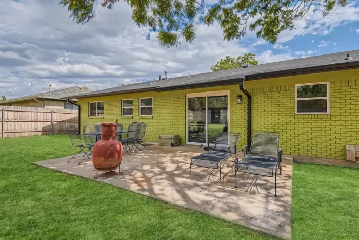 Cozy patio with comfortable seating and a peaceful atmosphere, perfect for morning coffee or evening relaxation.