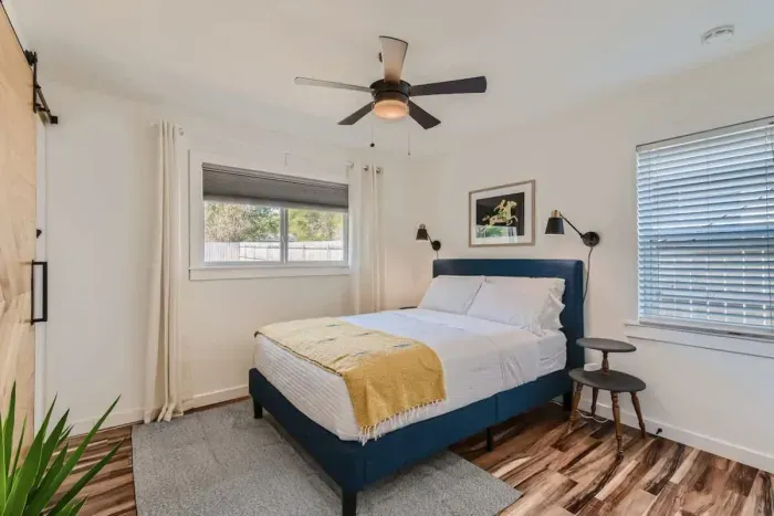 Relax in the spacious primary bedroom, complete with a private ensuite bathroom. The serene retreat offers comfort and style, with elegant furnishings and modern finishes, ensuring a peaceful and luxurious stay.