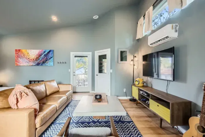 Equipped with a large TV, cozy seating, and space for everyone.