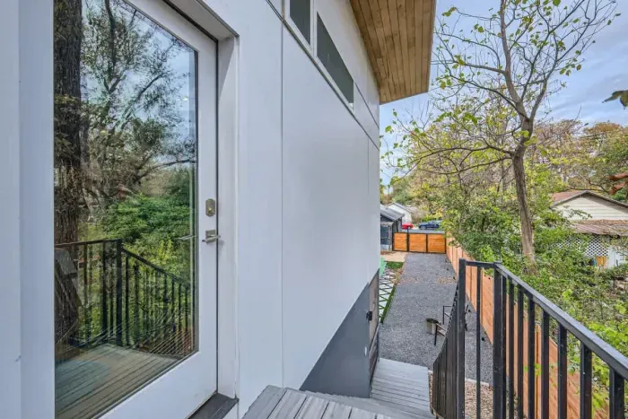 Inviting facade with a cozy front porch and stylish details.