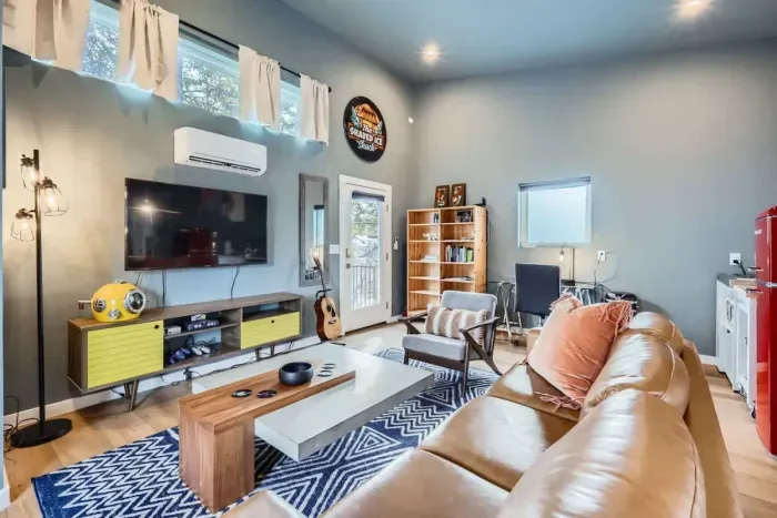Kick back in a cozy living room with plenty of seating for everyone.