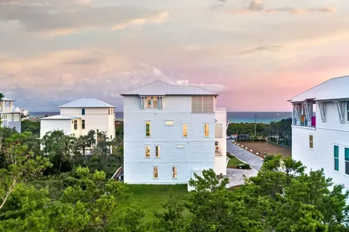 Surrounded by lush greenery and nestled in a peaceful coastal community, this home offers a private escape with stunning views.