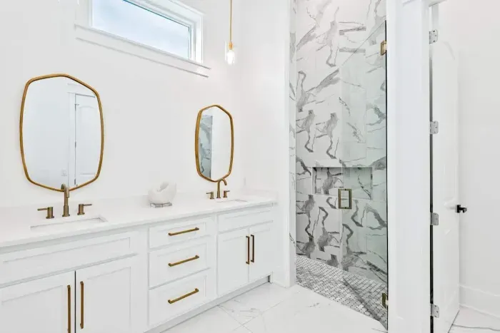 Cozy bathroom with a walk-in shower and chic, minimalist design.