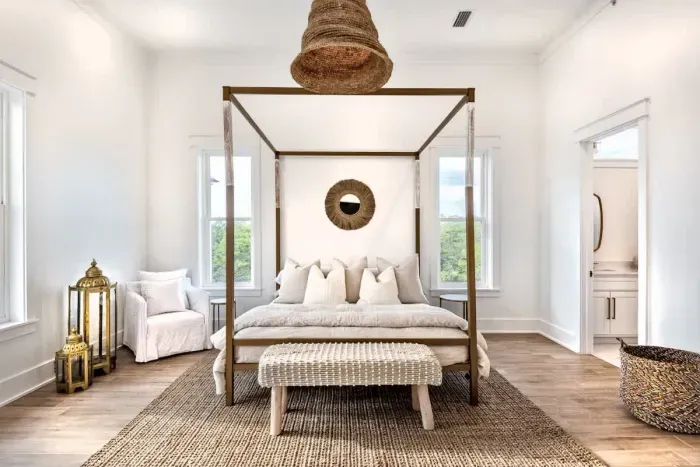 Relax in style with woven accents, a plush bed, and an en-suite bathroom just steps away.