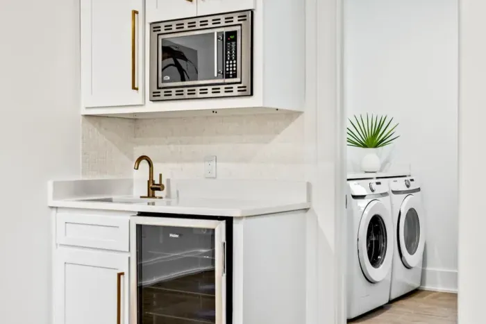 Efficient laundry space with modern appliances and a practical layout for completing laundry tasks with ease.