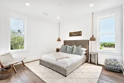Thoughtfully designed with comfort in mind, this bedroom offers a seamless blend of warmth and sophistication.