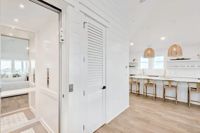 Enjoy the convenience of elevator access that opens directly into the kitchen and living room, making every arrival effortless and seamless.