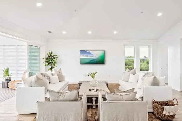 Equipped with a large TV, cozy seating, and space for everyone