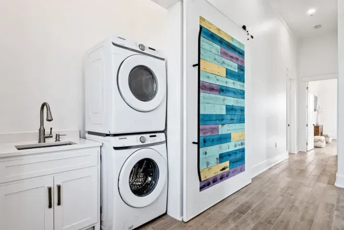 Convenient laundry area with a washer and dryer, making packing a breeze.