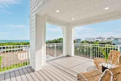 Inviting patio with plenty of seating and beautiful greenery, creating a serene outdoor retreat.