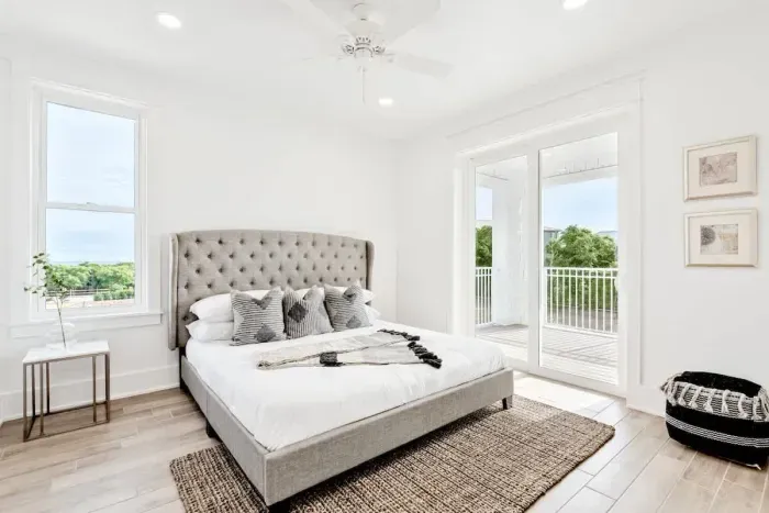 Luxurious bedroom with premium linens and a reading nook for ultimate relaxation.