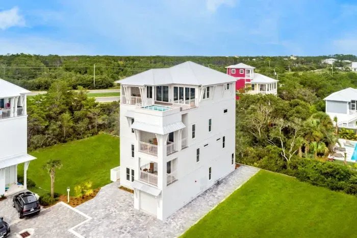 Dreamy coastal retreat with balconies made for sunsets.