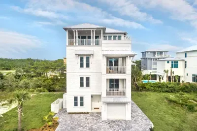 Modern coastal home with multiple balconies.