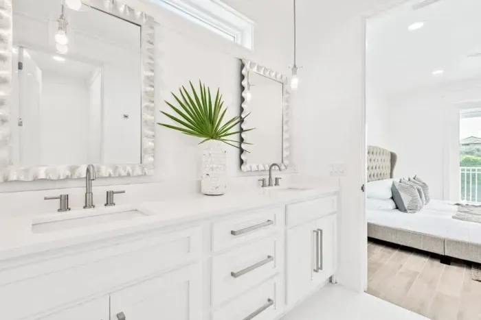 Modern bathroom with sleek fixtures, a spacious shower, and high-end amenities.