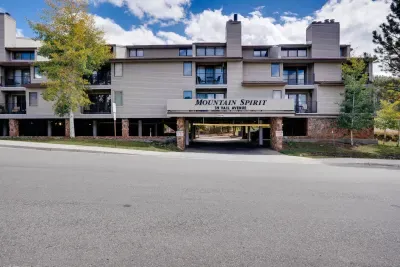 Welcoming building frontage with beautiful fall colors and mountain character.