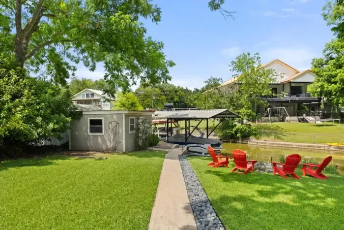 Beautiful backyard view with greenery all around.