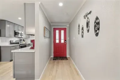 Welcome to a beautiful entrance that sets the tone for the rest of the home. With inviting décor, soft lighting, and a spacious layout, it creates a warm and stylish first impression.