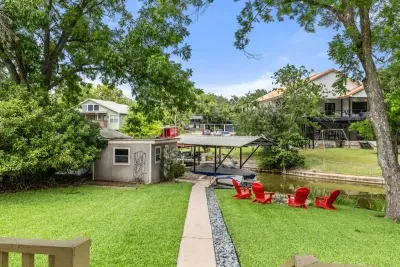 Private patio with lush plants and a calming atmosphere, perfect for unwinding after a long day.