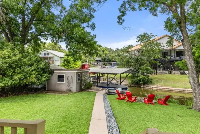 Private patio with lush plants and a calming atmosphere, perfect for unwinding after a long day.