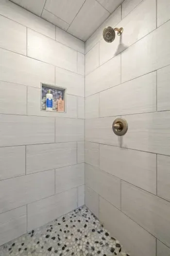 Step into a rainfall shower with endless hot water, ready to recharge you after a day of exploring.