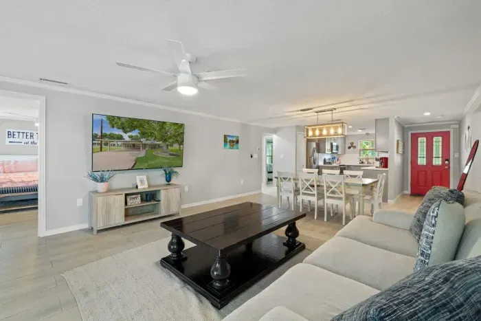 Gather in the spacious living room, perfect for college football fans! With plenty of seating and a large TV, it’s the ideal spot to watch the game, cheer on your team, and enjoy a fun, lively atmosphere.