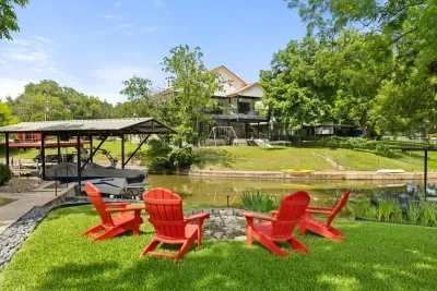 Cozy backyard retreat with a fire pit, and comfortable seating.