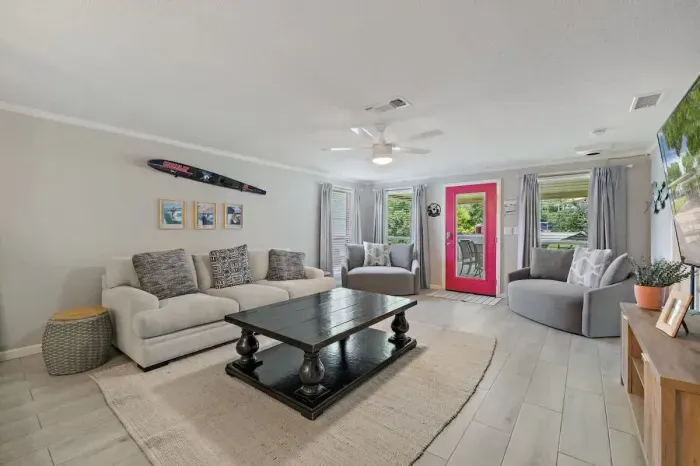 Living room - Plenty of seating for everyone. Catch your favorite game on the MASSIVE large screen or sit back and relax to play your favorite board/card game.