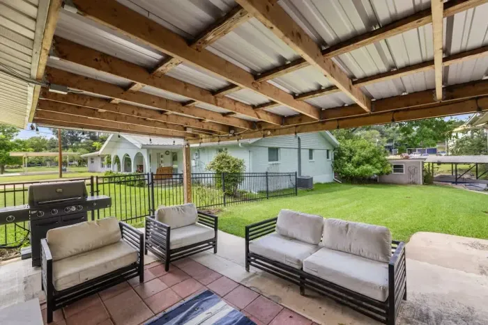 Cozy patio with comfortable seating and a peaceful atmosphere, perfect for morning coffee or evening relaxation.