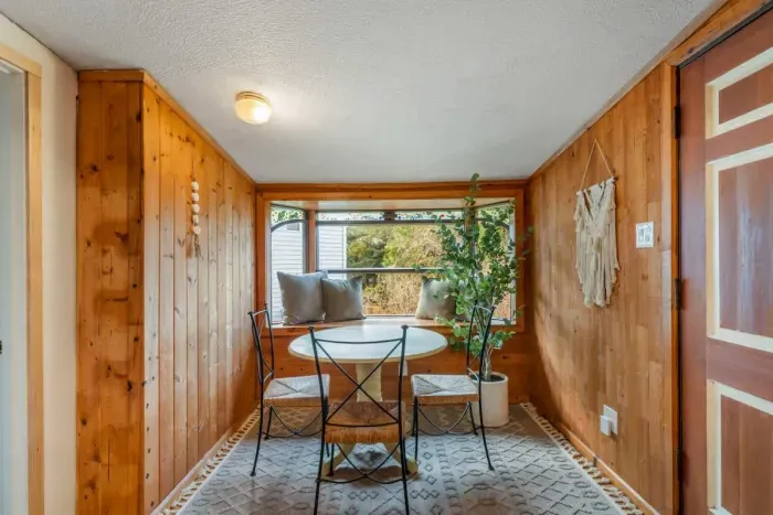 Charming dining nook with rustic accents and plenty of natural light.