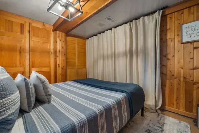 Enjoy the quiet comfort of a queen bed, stylish furnishings, and cozy accents