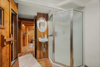 Charming bathroom with a vintage touch and modern conveniences.