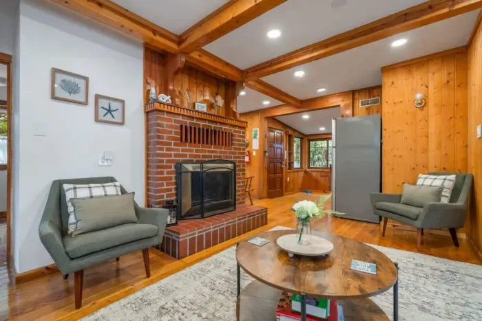 4. Stylish living room featuring a statement fireplace and elegant decor.